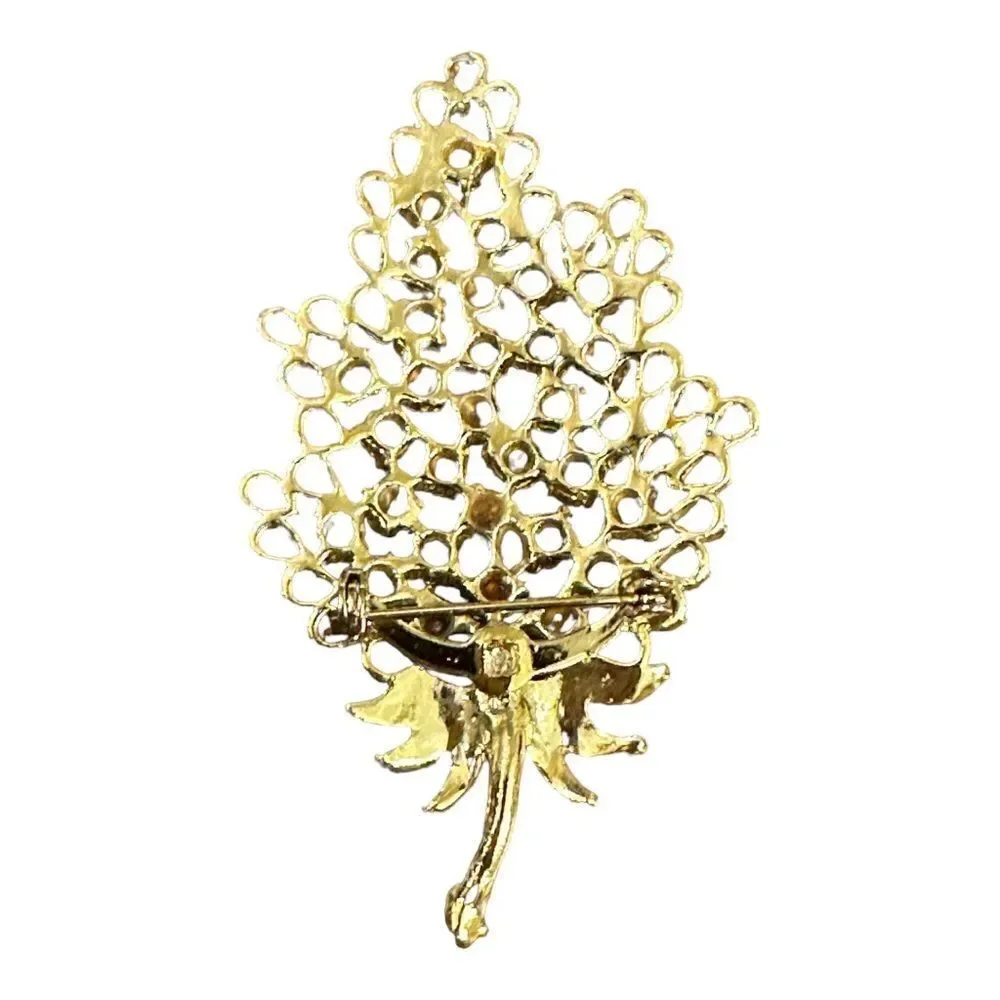 Vintage brooch single leaf amber rhinestones. Pin back, good toned, amazing
